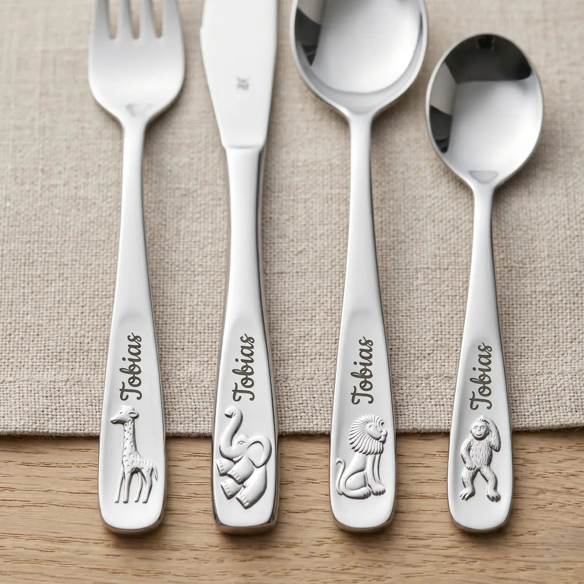 WMF Kinderbesteck Set 4-teilig aus glänzendem Cromargan Edelstahl mit Tiermotiven, personalisiert mit einer Gravur. — Tiere