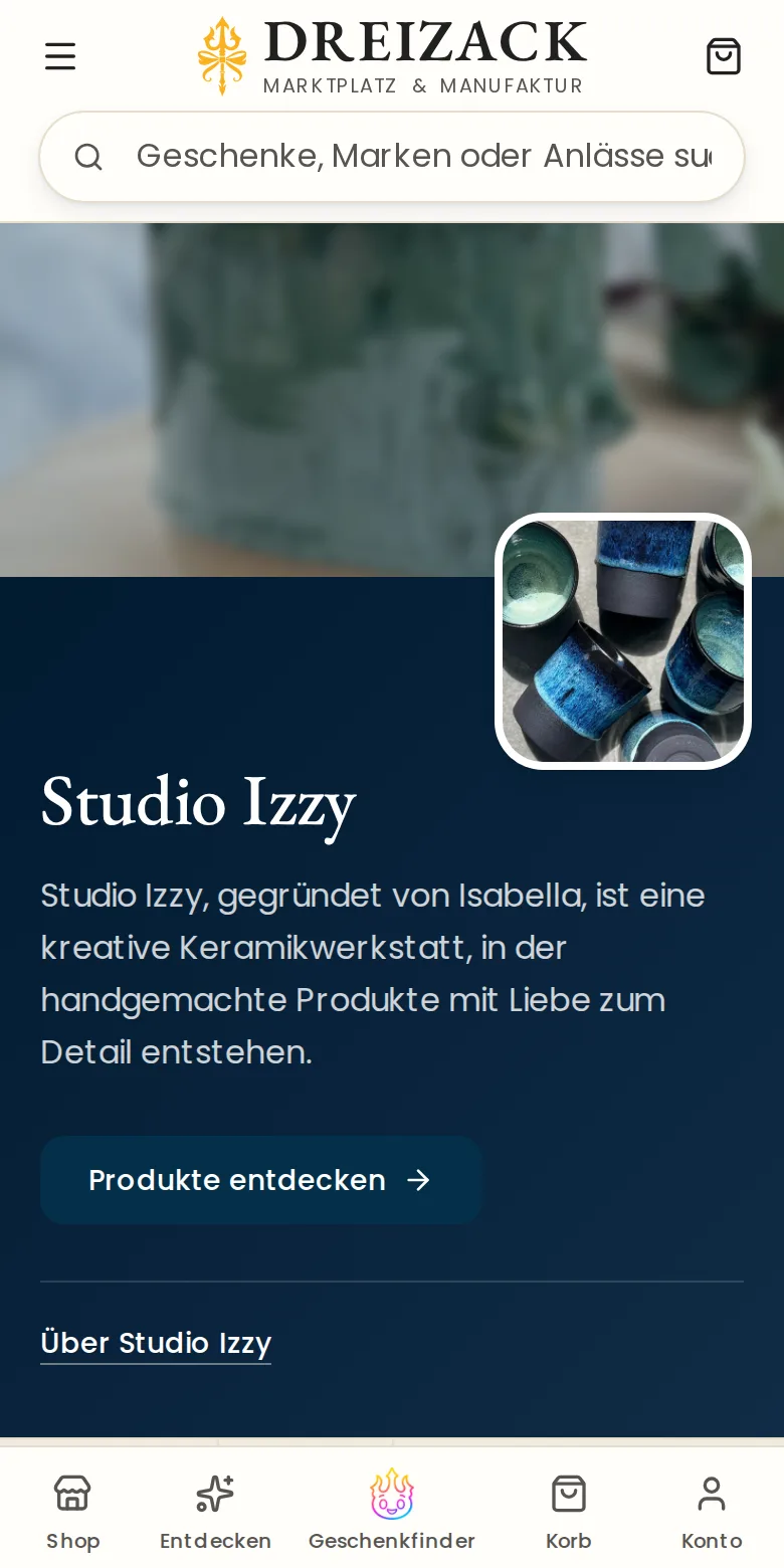 Dieselbe Herstellerseite von Studio Izzy am Handy mit Logo, Name, Satz zur Marke und Knopf Produkte entdecken