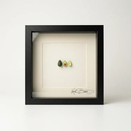 Bilderrahmen von Kunstbissen mit Miniatur Avocados
