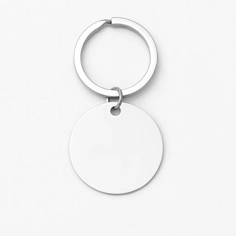 Runder Schlüsselanhänger mit Wunschgravur und Fotogravur aus Edelstahl, handgefertigt von Dreizack in Wien
