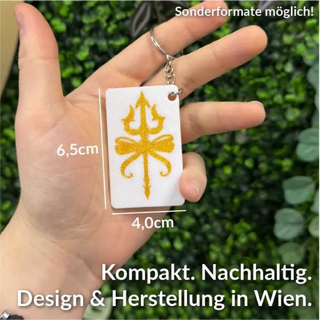 Nahaufnahme des Keynect NFC-Schlüsselanhängers inkl. Größe mit strukturierter Oberfläche, 3D-Druck-Optik und glänzender Öse.