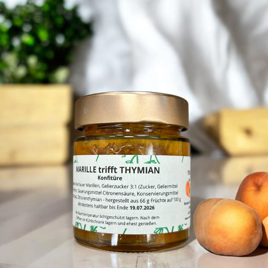 Marille trifft Thymian Konfitüre – Handgemachte, fruchtig-würzige Konfitüre aus Wachauer Marillen und Zitronenthymian, in 150 g Glas. Ideal für Brot, Käse und kreative Rezepte.