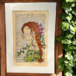 Original-Illustration von Book Fairy Art auf alter Buchseite mit Passepartout und optionalem Nussrahmen – nachhaltige Kunst aus Österreich