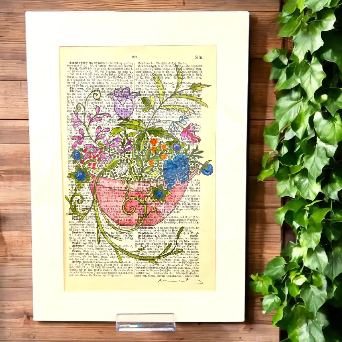 Original-Illustration von Book Fairy Art auf alter Buchseite mit Passepartout und optionalem Nussrahmen – nachhaltige Kunst aus Österreich