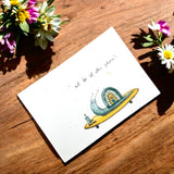 Saat-Postkarte von Seedpap, handgeschöpft mit integriertem Saatgut. Nach dem Einpflanzen wachsen Wildblumen. Nachhaltige Grußkarte, ideal für umweltbewusste Menschen.