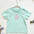MiniDei Design Bio Baumwoll T-Shirt "Seepferdchen", aus 100% Bio-Baumwolle, handgezeichnetes Seepferdchen-Motiv, schadstoffgeprüft, in verschiedenen Größen erhältlich.
