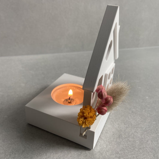 Teelichthalter aus Gießbeton in Häuschen- und Kürbis-Design, dekoriert mit herbstlichen Trockenblumen, wirft einen schönen Schatten und sorgt für eine gemütliche Atmosphäre in Herbst- und Wintermonaten.