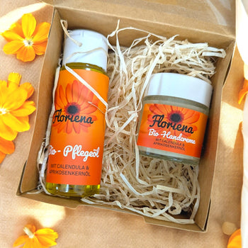 Handgemachtes Bio-Geschenkpaket von Floriena mit Pflegeöl & Handcreme, nachhaltig verpackt, Demeter-zertifizierte Naturkosmetik aus Österreich.