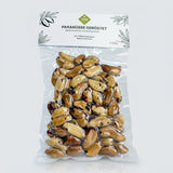 Nahaufnahme von gerösteten, naturbelassenen Paranüssen in einer Holzschale. — 200g
