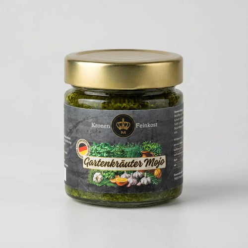 Ein Glas Gartenkräuter Mojo mit kräftiger grüner Kräutersauce und dem Etikett von Kronenfeinkost