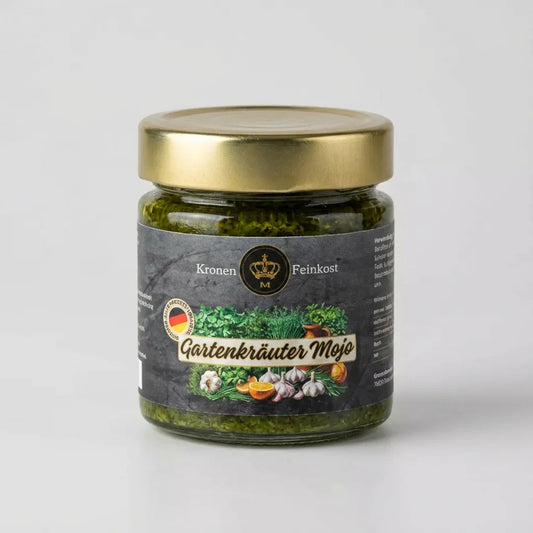 Ein Glas Gartenkräuter Mojo mit kräftiger grüner Kräutersauce und dem Etikett von Kronenfeinkost