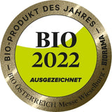 Ein Glas Kichererbsen Miso Bio mit braun-gelblichen, grobstückigen Paste und einem weißen Etikett.