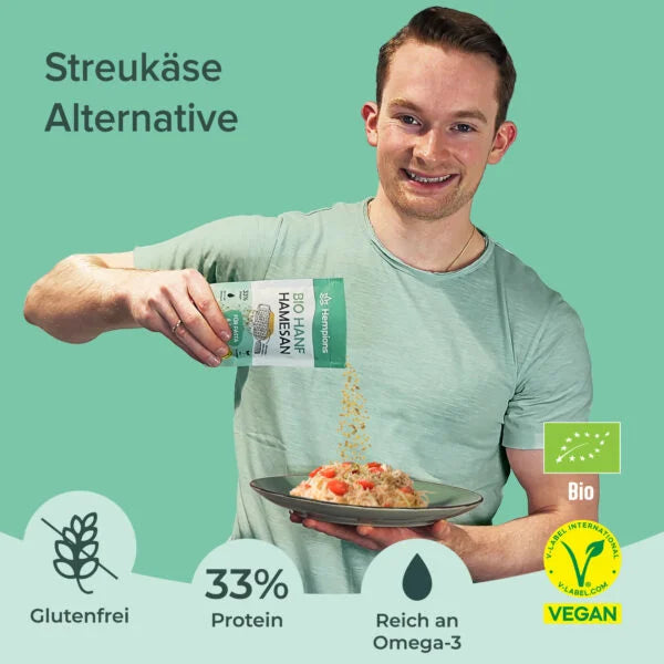 Bio Hanf Hamesan Streukäse Alternative in Pulverform, hellbraun mit kleinen Flocken, bereit zum Bestreuen.