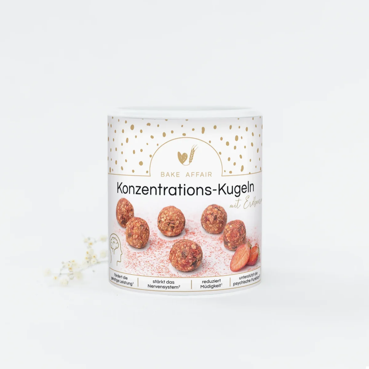 Fruchtige rote Konzentrations-Kugeln mit Erdbeerstückchen in einer nachhaltigen Verpackung.