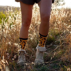 Sportliche Socken mit Leopardenmuster aus Baumwolle, nahtlos verarbeitet mit gepolsterter Innensohle.