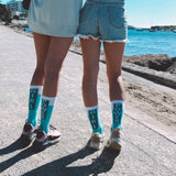 Rosa Sportsocken für Damen aus Baumwolle mit Girl Power Schriftzug und gepolsterter Sohle.