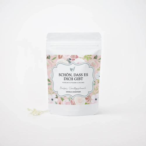 Kompaktes Teesäckchen mit der Aufschrift Schön dass es dich gibt und Früchtetee Inhalt